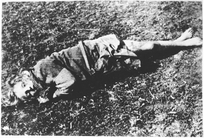 The body of a young girl at the Gadina execution site outside of Jasenovac